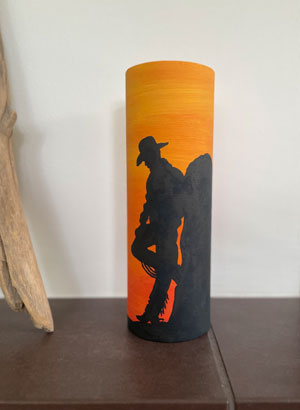 Zylin Dekorröhre Cowboy im Sonnenuntergang in Umgebung